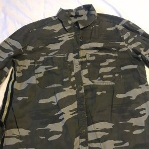 Size small Camouflage with gold stripes on the sides, press buttons, pockets